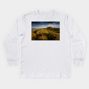 Bamburgh Castle at sunset Kids Long Sleeve T-Shirt